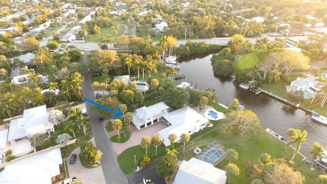 birds eye view of property featuring a water view