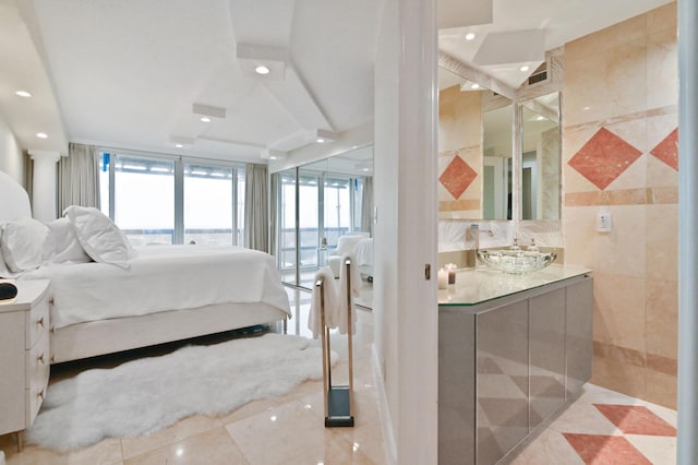 2800 S Ocean Blvd Unit 14-H, Boca Raton, FL 33432 - bedroom featuring light tile patterned floors, access to outside, a sink, and recessed lighting