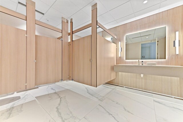 dining area with floor to ceiling windows, a healthy amount of sunlight, and light hardwood / wood-style floors