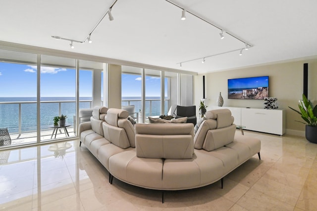 2800 S Ocean Blvd Unit 14-H, Boca Raton, FL 33432 - living room featuring rail lighting, expansive windows, a water view, and light tile patterned floors