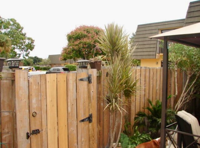 view of gate featuring fence