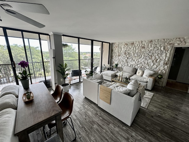 2816 N 46th Ave Unit J682, Hollywood, FL 33021 - living area featuring expansive windows, a ceiling fan, plenty of natural light, and dark wood-style flooring