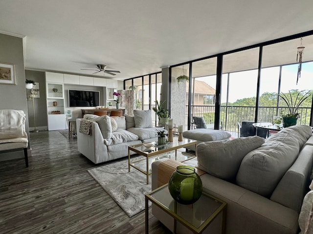 living room featuring ceiling fan, expansive windows, dark hardwood / wood-style flooring, and built in shelves