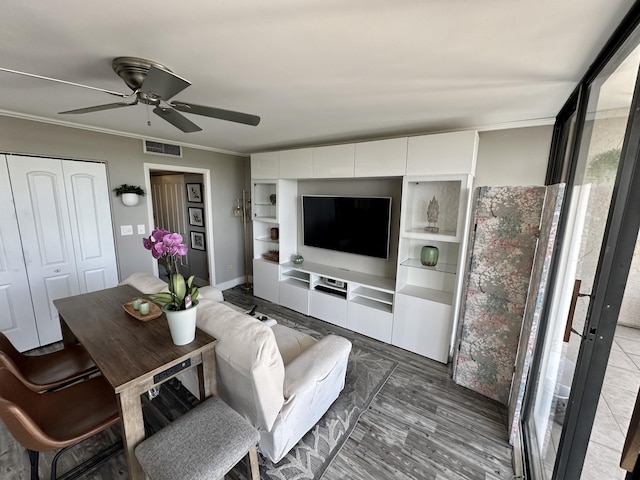 2816 N 46th Ave Unit J682, Hollywood, FL 33021 - living area featuring a ceiling fan, wood finished floors, and crown molding