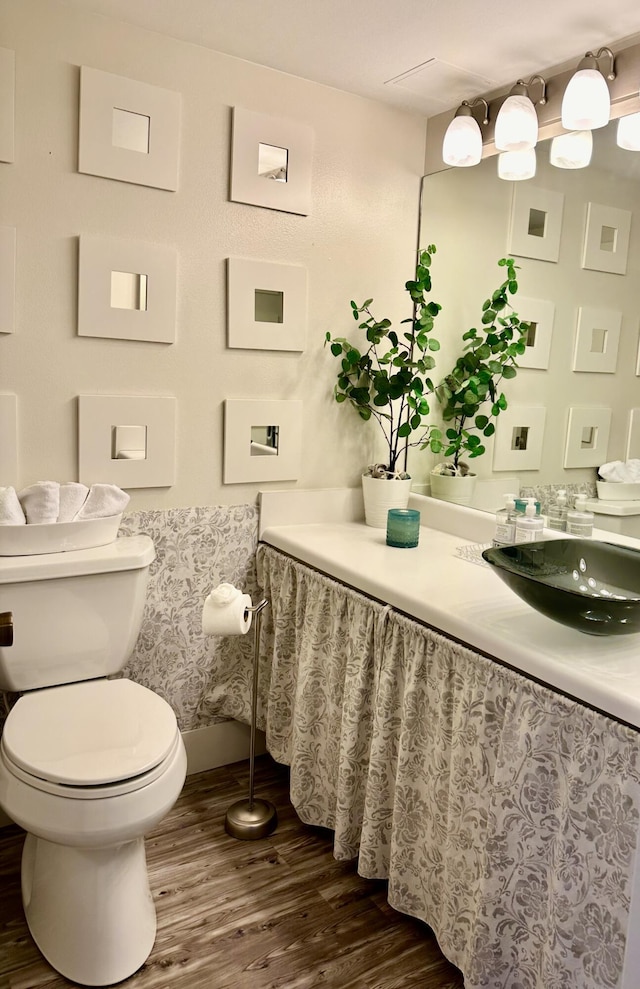 2816 N 46th Ave Unit J682, Hollywood, FL 33021 - bathroom with wood finished floors, toilet, and vanity