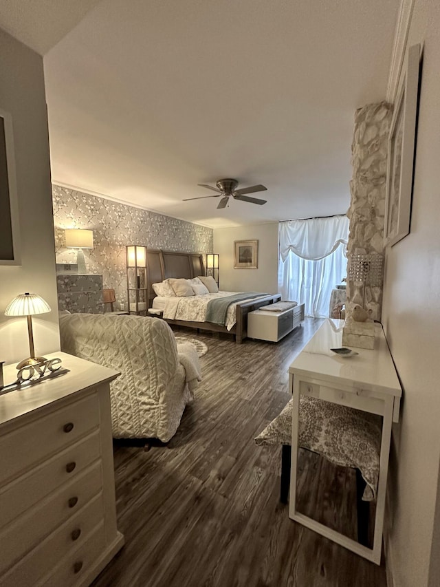 bedroom with ceiling fan and dark hardwood / wood-style floors