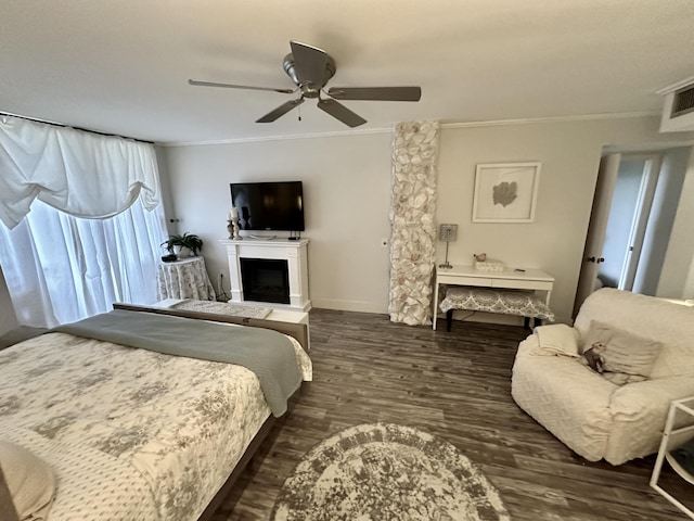 2816 N 46th Ave Unit J682, Hollywood, FL 33021 - bedroom with crown molding, wood finished floors, ceiling fan, a fireplace, and baseboards