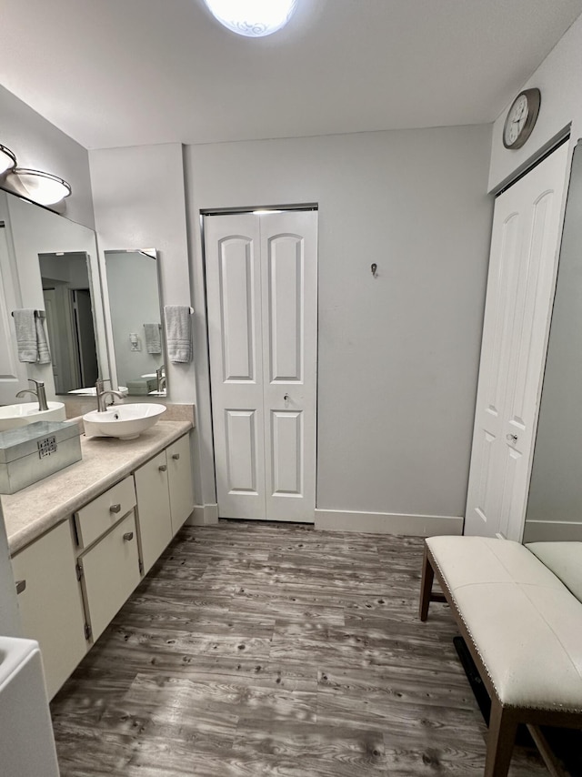 2816 N 46th Ave Unit J682, Hollywood, FL 33021 - full bath with wood finished floors, double vanity, and baseboards
