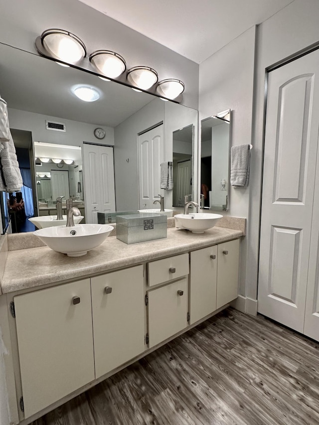 2816 N 46th Ave Unit J682, Hollywood, FL 33021 - bathroom with wood finished floors and double vanity