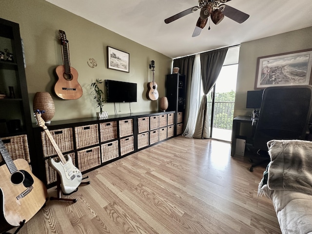 2816 N 46th Ave Unit J682, Hollywood, FL 33021 - living area with wood finished floors, ceiling fan, and an office area