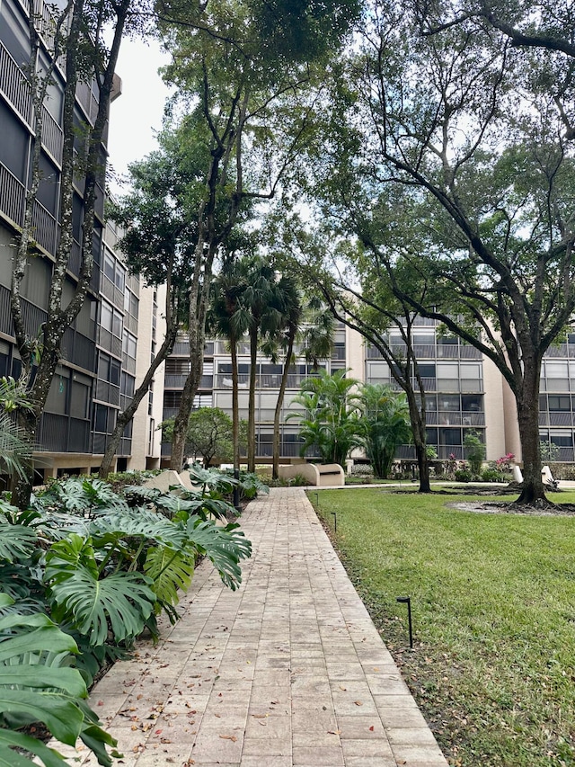 view of community featuring a lawn