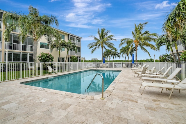 view of pool featuring a patio