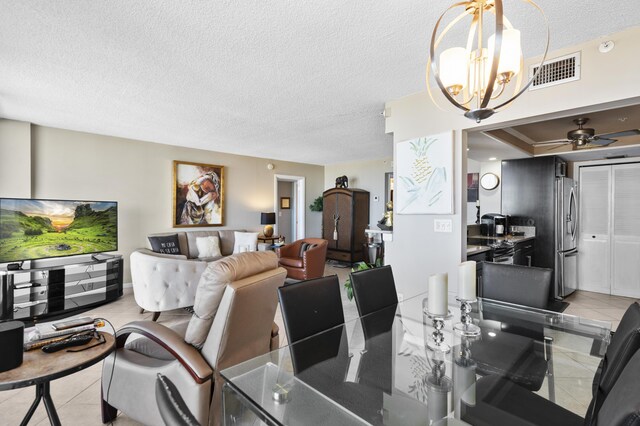 899 Jeffery St Unit 604, Boca Raton, FL 33487 - dining space featuring a chandelier, light tile patterned floors, a textured ceiling, ceiling fan, and a desk
