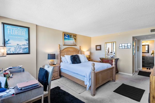 carpeted bedroom with a textured ceiling