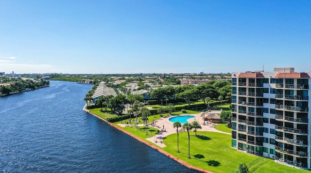 birds eye view of property with a water view