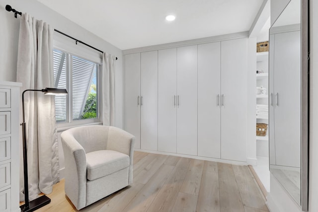 living area featuring light hardwood / wood-style flooring