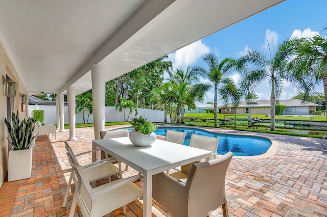 view of swimming pool featuring a patio area