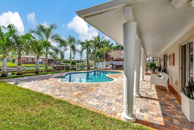 view of pool featuring a patio area