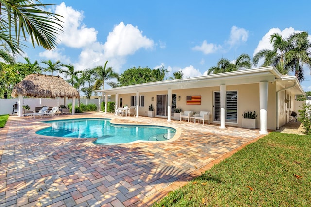 view of swimming pool with a patio area