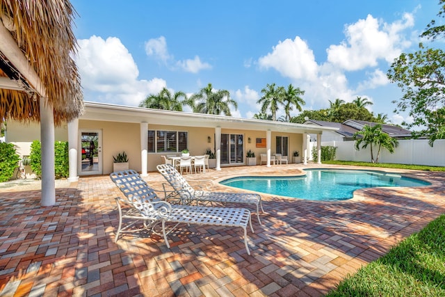 view of pool featuring a patio