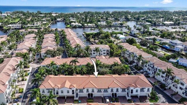 drone / aerial view featuring a water view