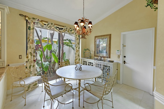 dining area with light tile patterned floors, ornamental molding, lofted ceiling, and a notable chandelier