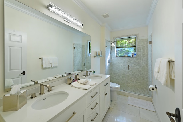 bathroom featuring tile patterned floors, toilet, a shower with door, vanity, and ornamental molding