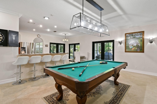 recreation room featuring crown molding, french doors, a textured ceiling, and pool table