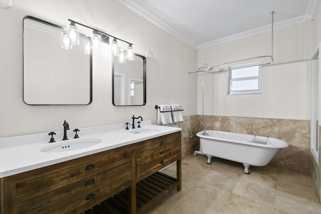 bathroom featuring ornamental molding, tile patterned floors, vanity, tile walls, and a bath