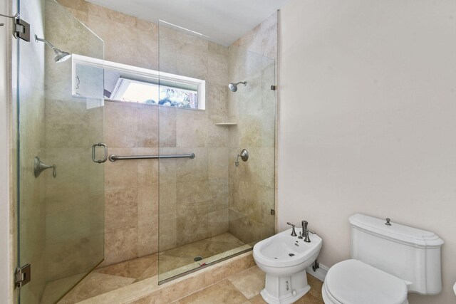 bathroom with an enclosed shower, toilet, a bidet, and tile patterned flooring