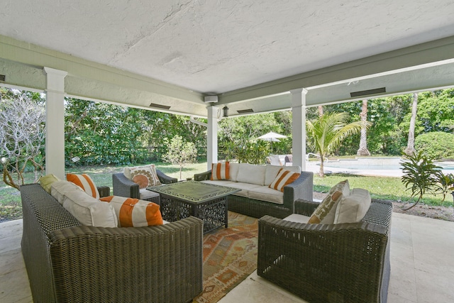 view of patio with an outdoor living space