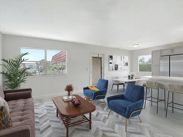 living room with light hardwood / wood-style flooring