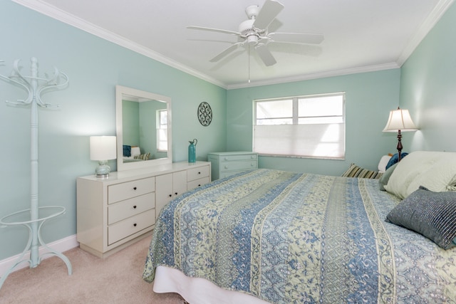 bedroom featuring ceiling fan, light carpet, and ornamental molding