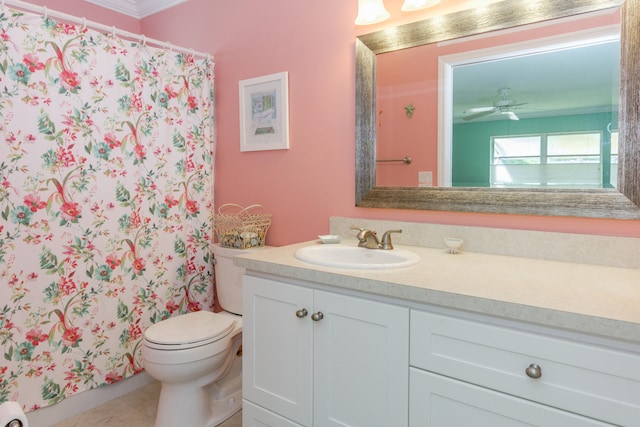 bathroom featuring ceiling fan, tile patterned floors, toilet, vanity, and ornamental molding