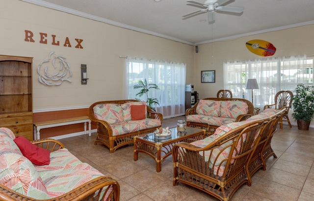 tiled living room with ceiling fan and ornamental molding