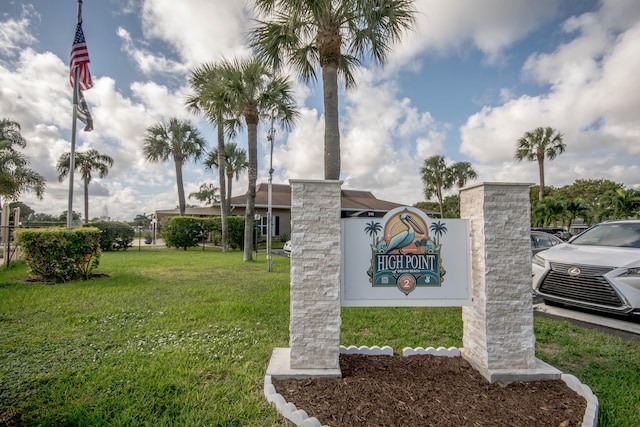 community sign with a yard