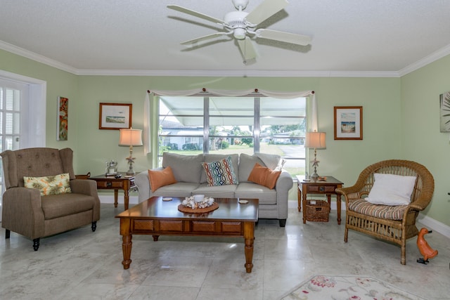 living room with ceiling fan, crown molding, and a textured ceiling