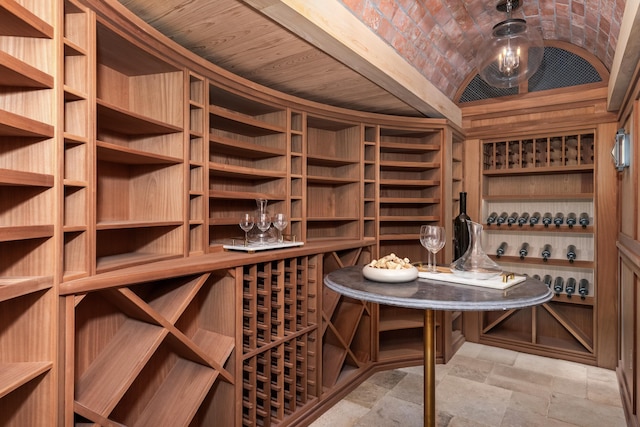 wine cellar with vaulted ceiling and wooden ceiling