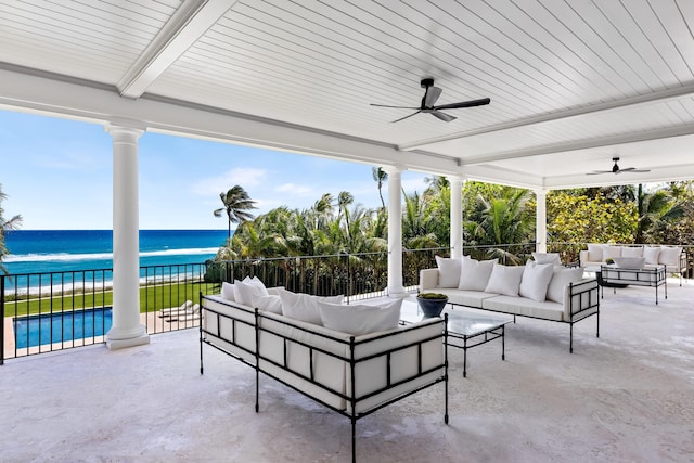 view of patio featuring an outdoor living space, a water view, and ceiling fan