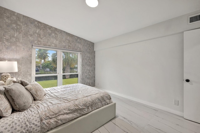 bedroom featuring vaulted ceiling