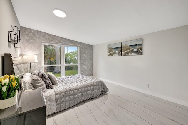 bedroom featuring lofted ceiling