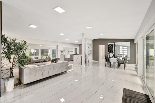 living room with lofted ceiling