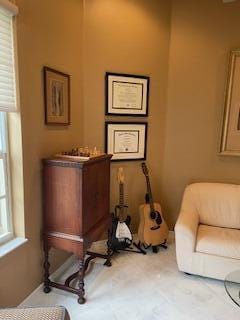 sitting room featuring carpet floors