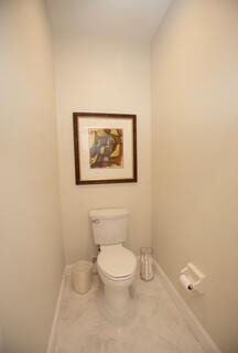 bathroom featuring toilet