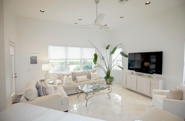 living room with ceiling fan