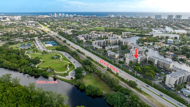 birds eye view of property featuring a water view