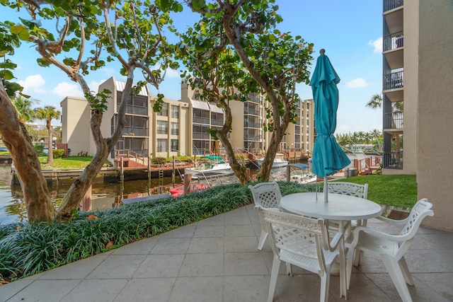 view of patio / terrace featuring a water view