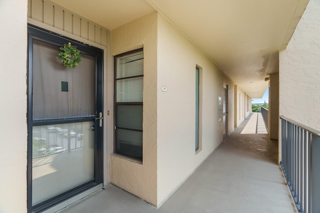 property entrance with a balcony