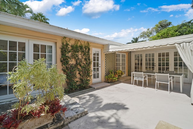 view of patio featuring french doors