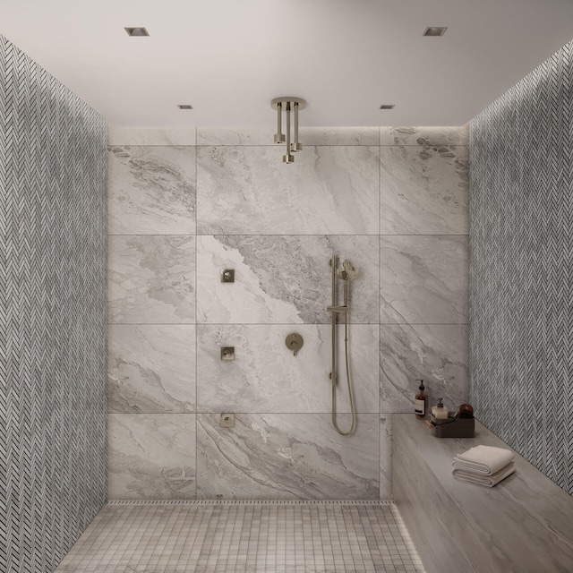 bathroom featuring a tile shower